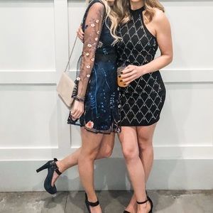 Worn once gorgeous dress with mesh floral sleeves